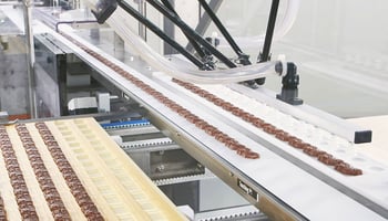 Flexible robotic system solution for chocolate squares & seasonal shapes