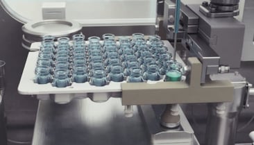 Pharmaceutical RTU filling line handling a tray of vials, demonstrating adaptability to various output requirements