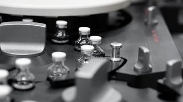 Pharmaceutical RTU filling line handling a tray of vials, demonstrating adaptability to various output requirements